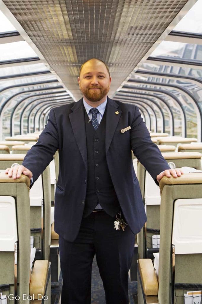 Guest Service Manager Ira Young aboard the Rocky Mountaineer train.