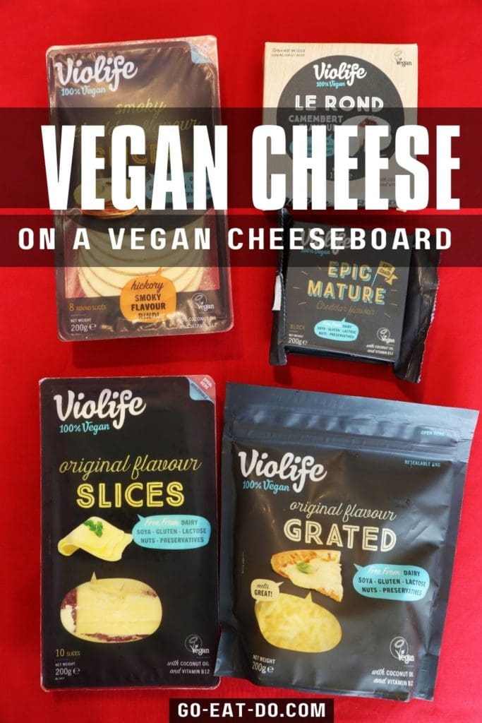 Pinterest pin for Go Eat Do's look at Violife products served as part of a vegan cheese platter and on nachos.