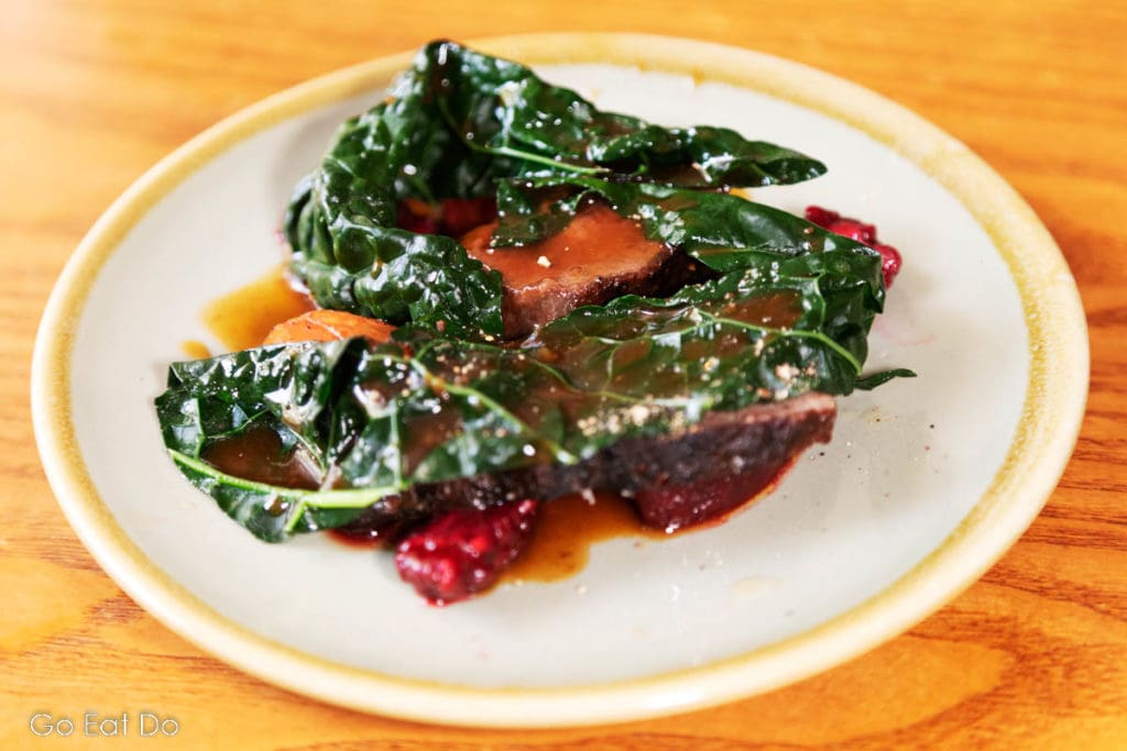 A succulent dish with venison and greens on the tasting menu at Coarse in Durham