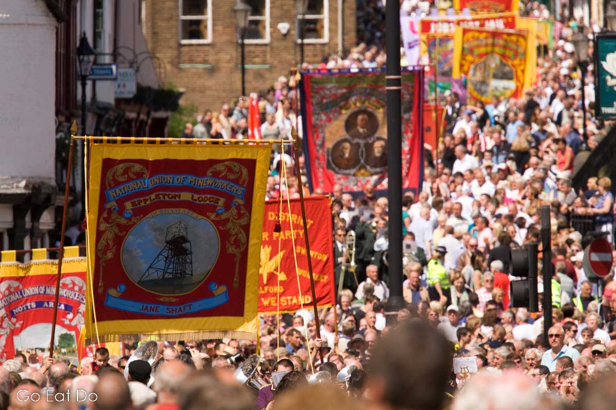 Banners being paraded through Durham city centre during Durham Miners' Gala