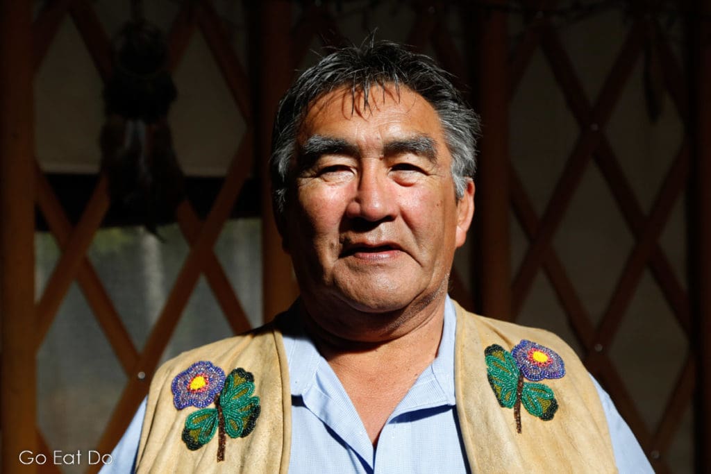 James Allen, a former chief of the Champagne and Aishihik First Nations, wearing a waistcoat bearing traditional beadwork.