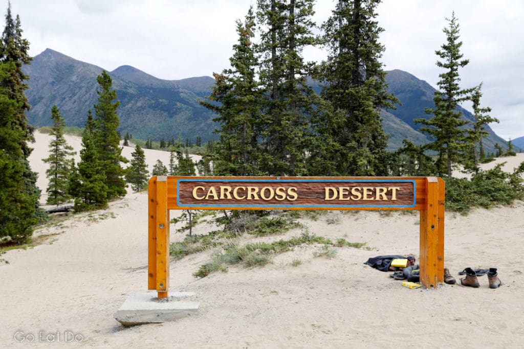Sign for the Carcross Desert, the smallest desert in the world, in the Yukon, Canada.
