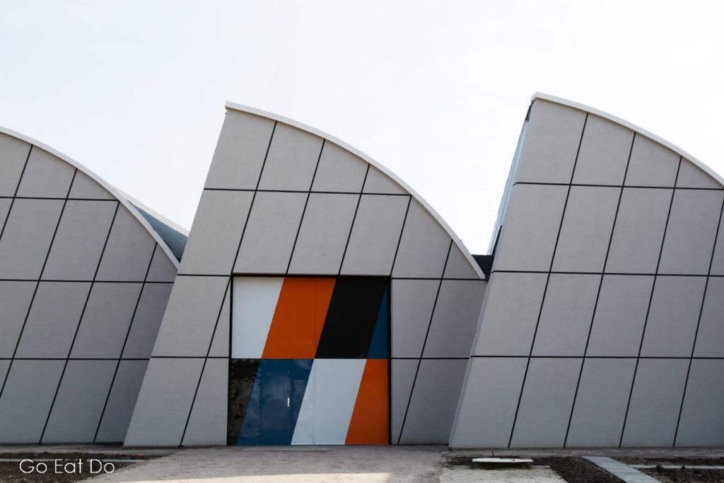The arched exterior of the De Ploeg factory, designed by Gerrit Rietveld, at Bergeijk in the Netherlands.