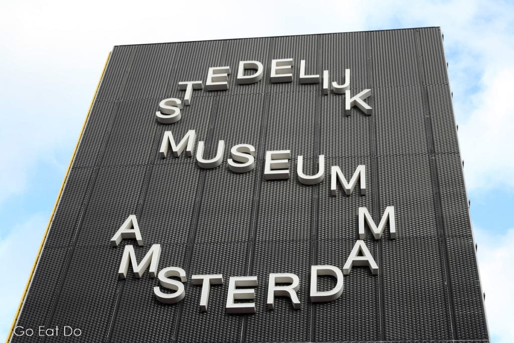 Sign for the Stedelijk Museum in Amsterdam has De Stijl artefects in its expansive collection.