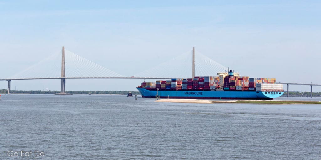 Freighter sailing towards the Arthur Ravenel Jr. Bridge in Charleston Harbor.