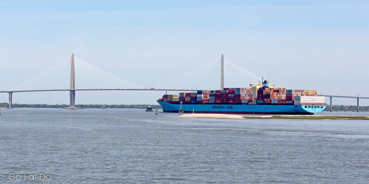 A freighter sailing towards the Arthur Ravenel Jr. Bridge in Charleston Harbor.