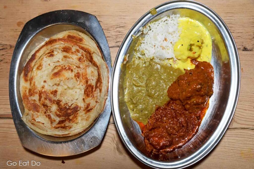 Malabar Parota plus a selection of South Indian food served at Dosa Kitchen, a popular Newcastle Indian restaurant.
