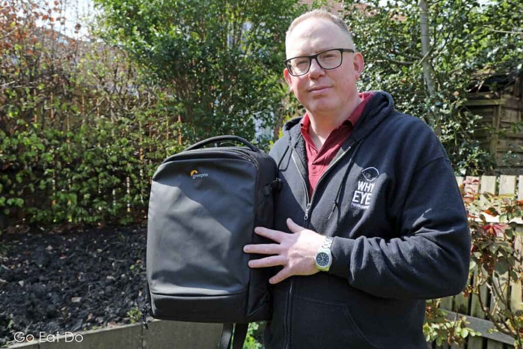 Professional photographer Stuart Forster with a Lowepro Flipside BP 400 AW III camera bag.