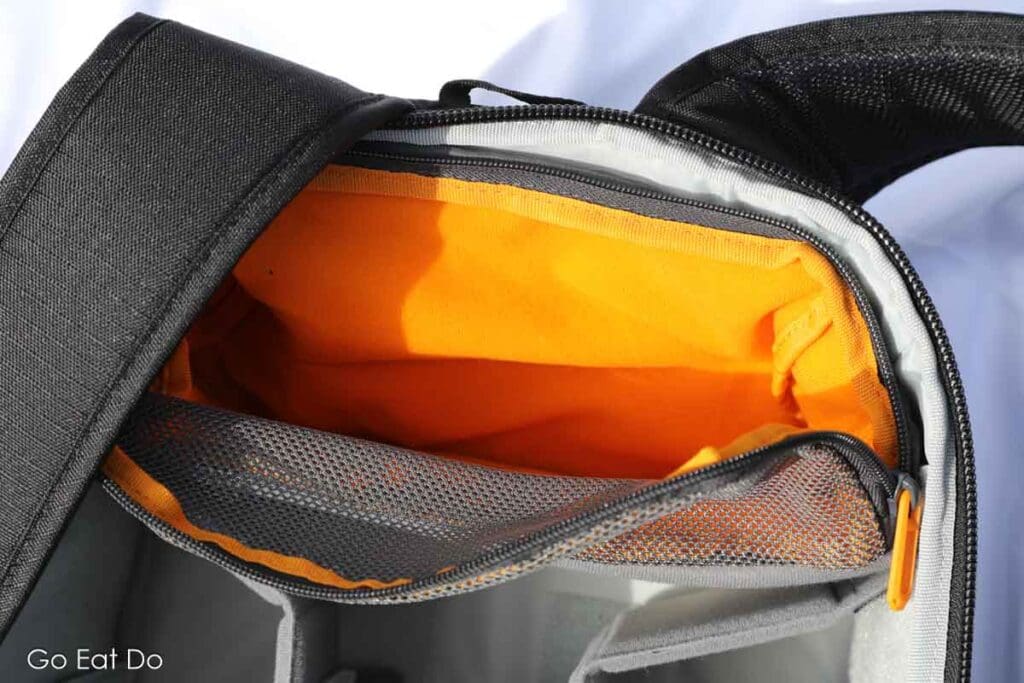 The detachable compartment is padded and offers space for personal items or food during a hike.
