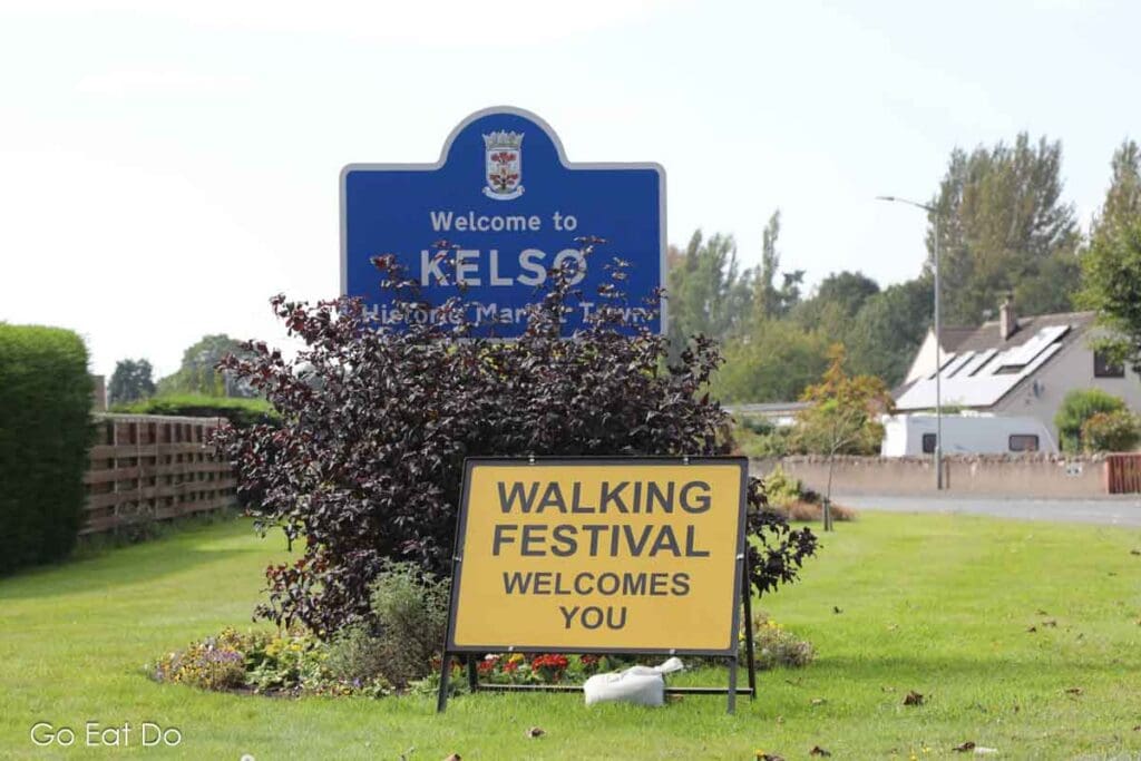 Welcome to Kelso sign with another welcoming participants of the Scottish Borders Walking Festival.