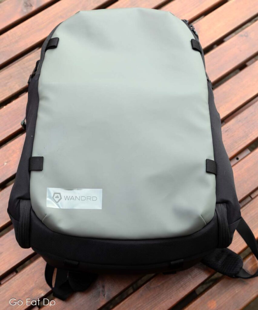 A Wasatch Green WANDRD STRATUS Photo 18L bag.
